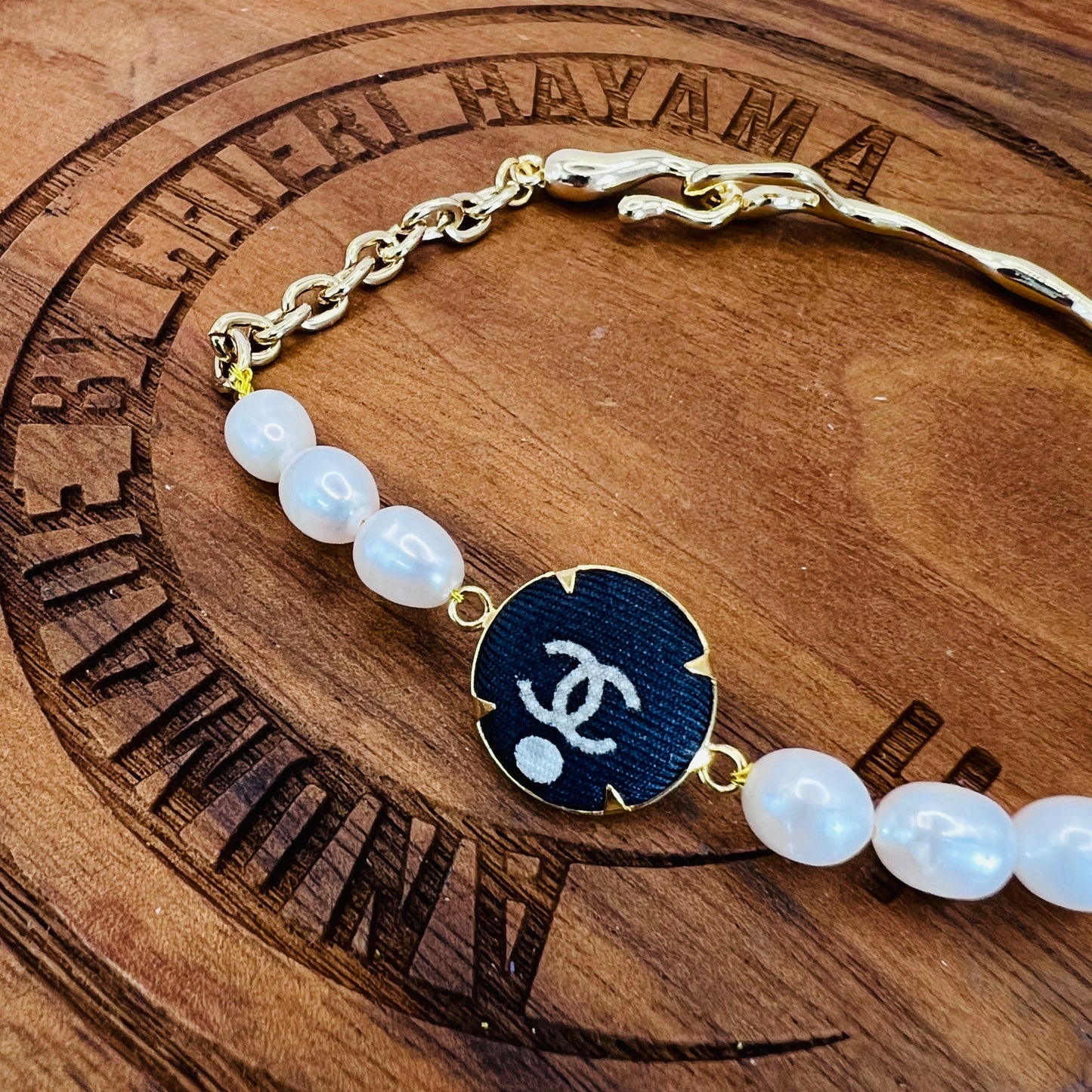 CC- Grey pearl with CC logo CC038- bracelet & earrings