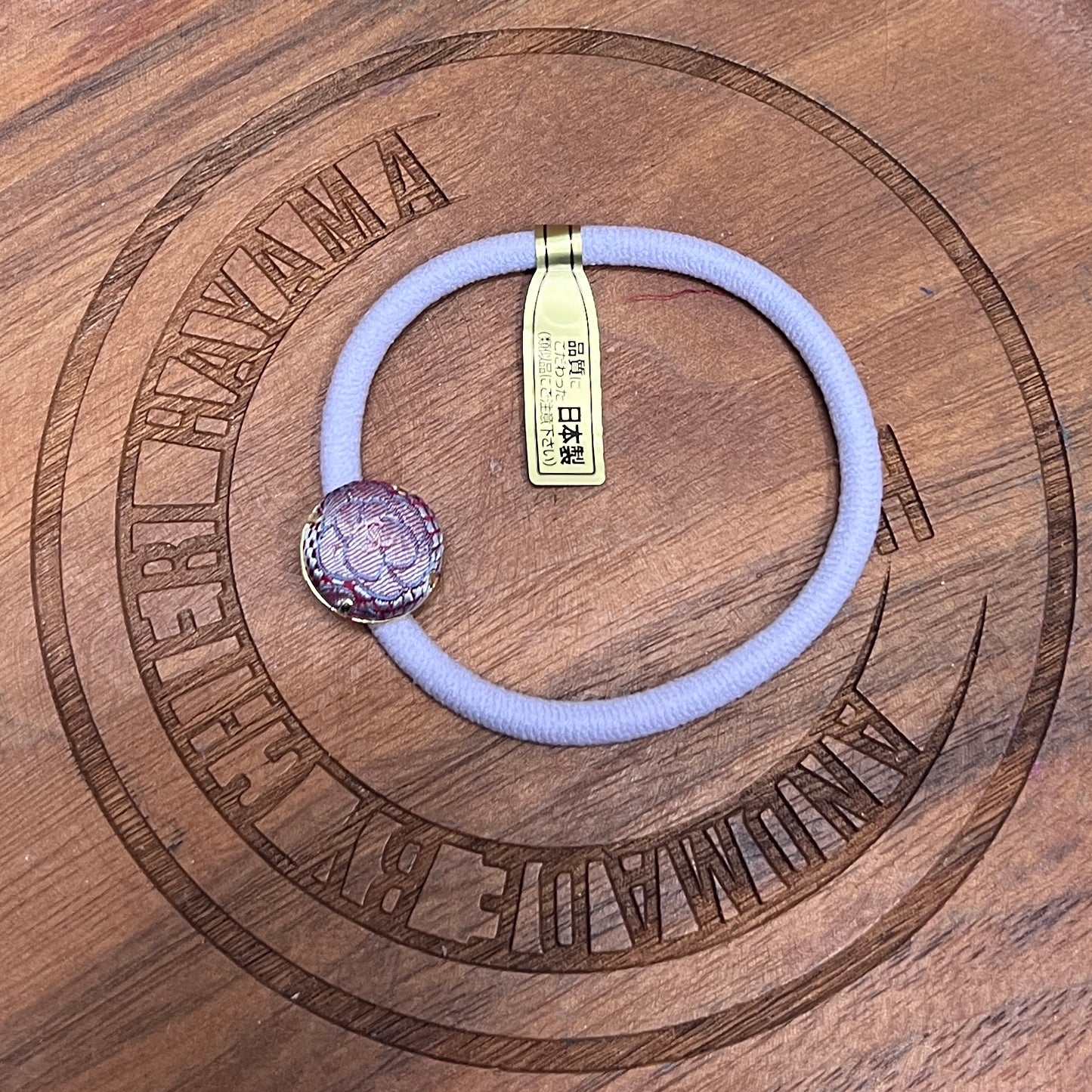 CC- Greyish purple Camellias with CC logo CC086- Hairband