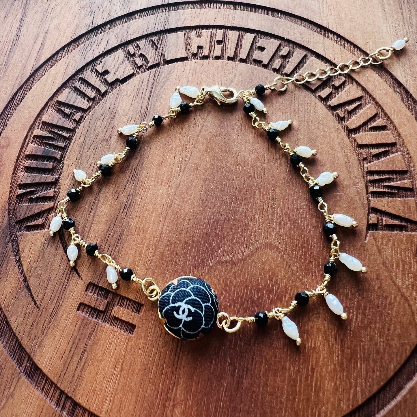 CC- Black & White Camellias with CC logo CC039- genuine pearl & onyx bracelet